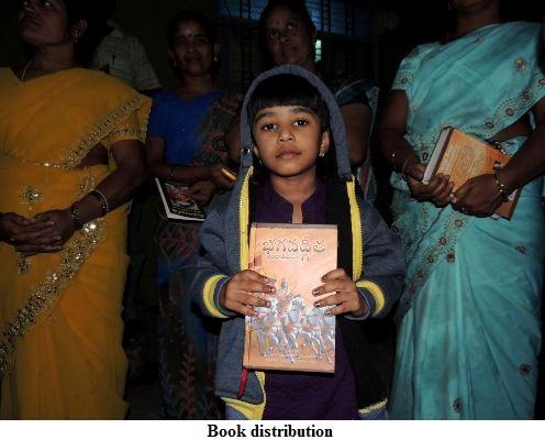 Edited with caption Devotees_distributing_books